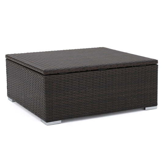 The Santa Rosa - Storage Table is a square outdoor coffee table featuring a dark brown wicker design, a flat top, and short silver metal legs, displayed against a white background.