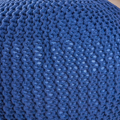 Close-up of the Bordeaux Knitted Cotton Round Pouf, showcasing its blue textured fabric and repeating pattern of raised stitches—ideal as a versatile ottoman or floor cushion.