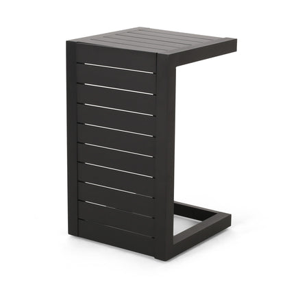 The Aluminum Outdoor C-Shaped Side Table for patio is a modern black metal table with horizontal slats on the sides and top, designed to slide easily under sofas or chairs.
