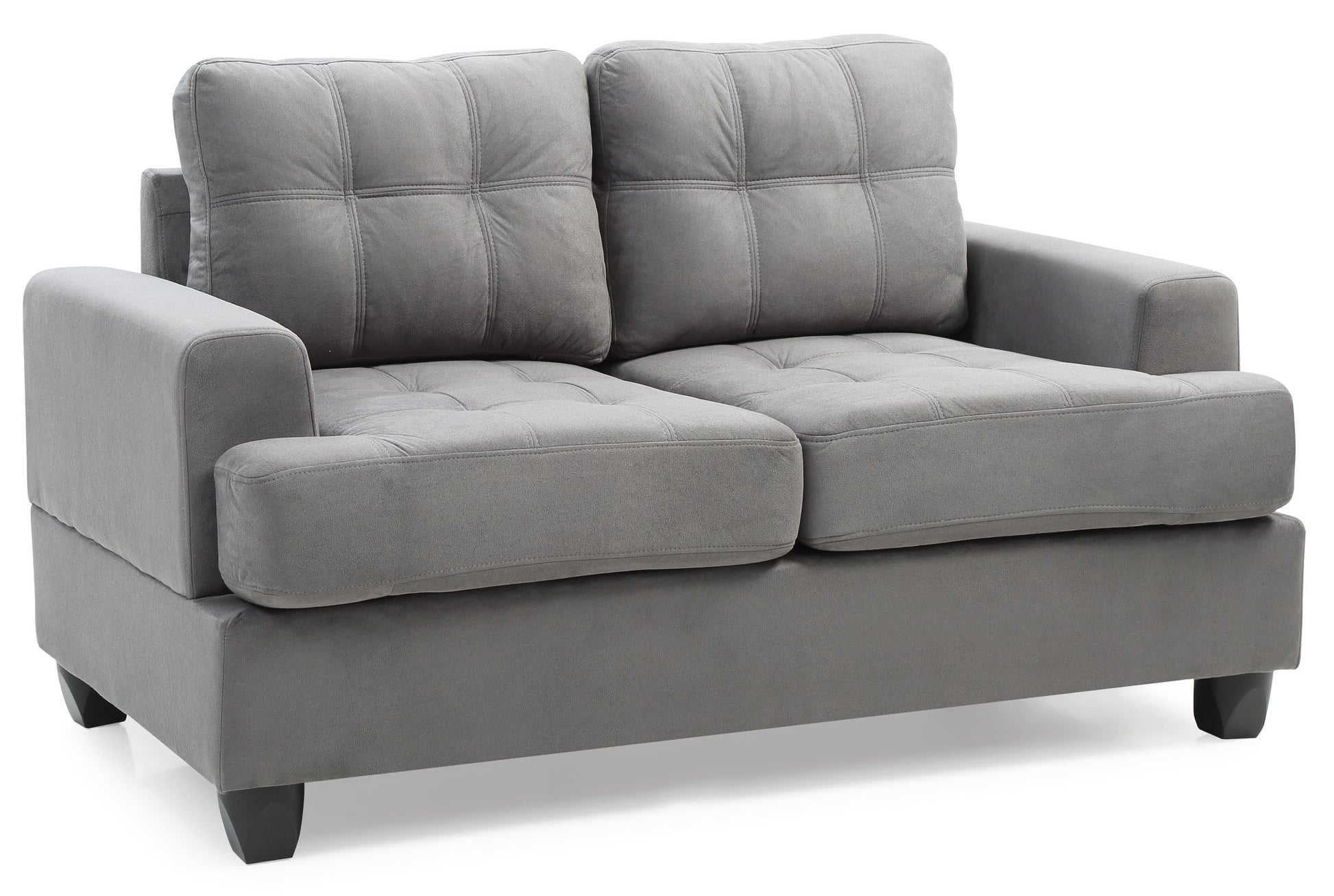 The Stylish Transitional Loveseat For Two features soft gray fabric upholstery, tufted back and seat cushions, wide armrests, short black legs, and a boxy contemporary design.