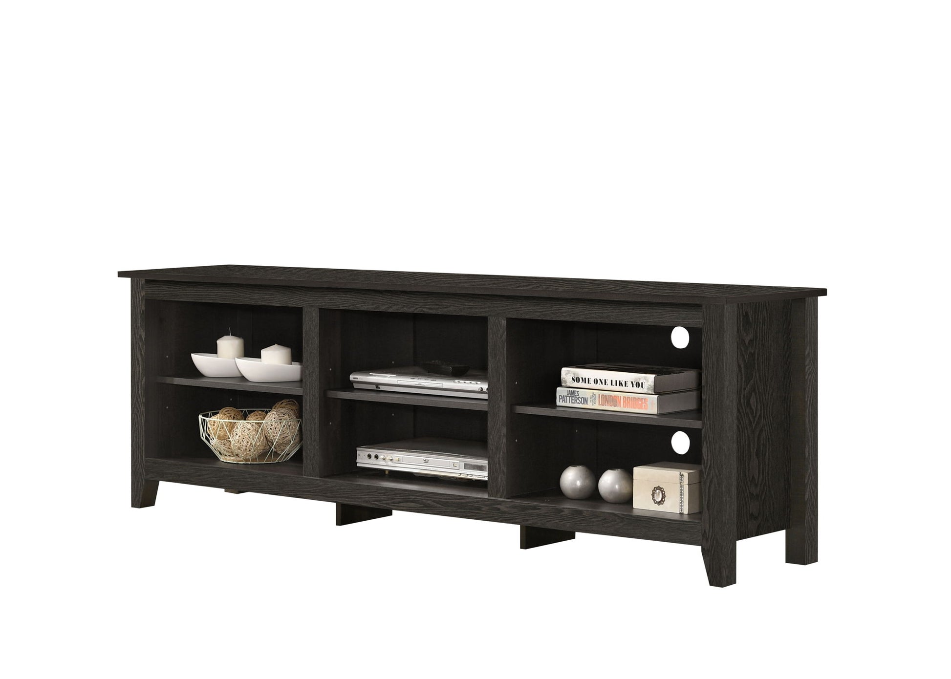 The Benito TV Stand features dark wood, three open shelves for books, bowls, decor, and devices, plus circular back cutouts for easy cable management.
