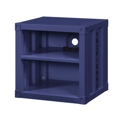 A square, dark blue Cargo - Nightstand With USB featuring an open front, two shelves, a cable hole in the back, and blocky corners. "YRCP18895" appears vertically on the side in black text.