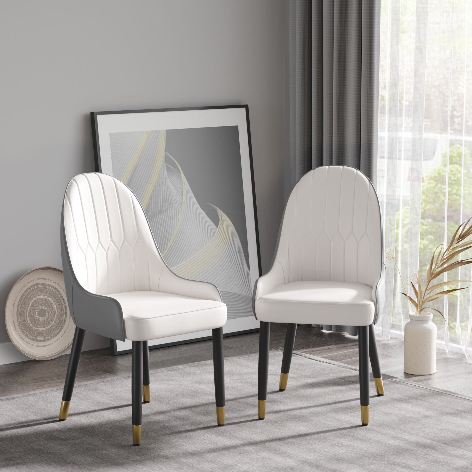 A set of two Modern PU Sponge-Filled Dining Chairs with solid wood metal legs sits in a bright room with abstract artwork, decor against a gray wall, sheer-curtained window, and a plant in a white vase nearby.