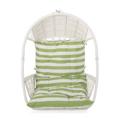 The Malia Wicker Hanging Chair features a white wicker frame and a green and white striped cushion on the seat and back, shown from the front.
