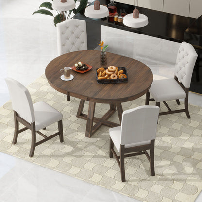 A Retro Functional Dining Set with a round table and upholstered chairs sits on a patterned rug. The table holds assorted pastries and a flower vase, with modern kitchen decor visible in the background.