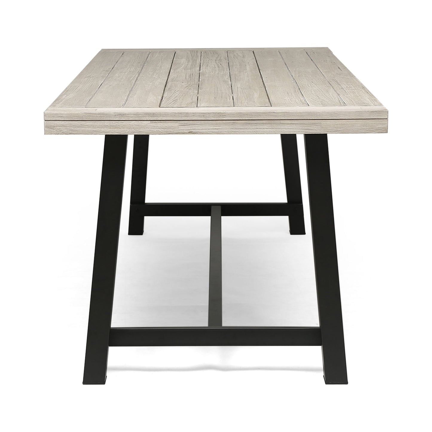 The Equilibrium Outdoor Dining Table features a light wooden slat top and black metal legs, shown from the short end against a white background.