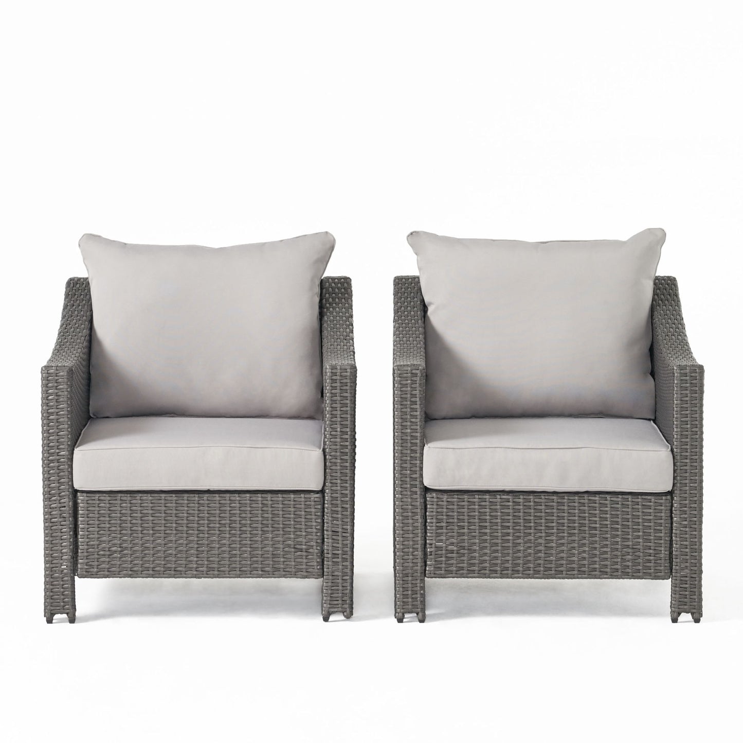 Two Antibes armchairs with woven rattan-style frames and water-resistant light gray cushions are placed side by side against a plain white background.