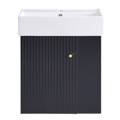 The Modern Floating Bathroom Vanity With Ceramic Basin is perfect for small bathrooms, featuring a rectangular white ceramic sink atop a dark ribbed cabinet with a small round gold handle.
