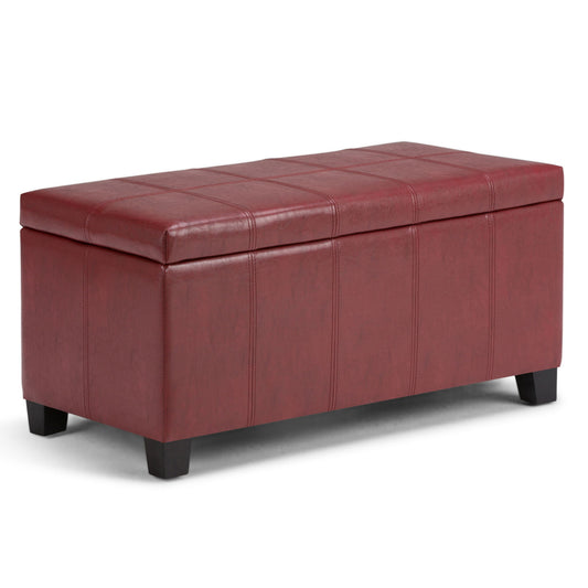The Dover Upholstered Storage Ottoman Bench is a rectangular maroon ottoman with stitched lid detailing and four short black wooden legs.