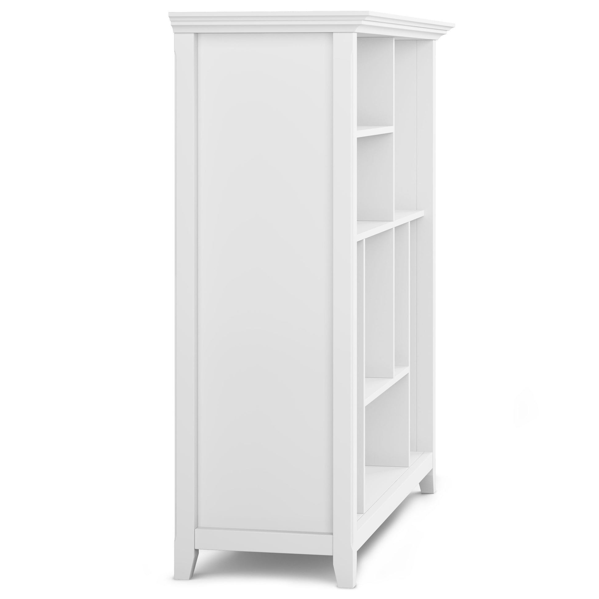 The Amherst - Multi Cube Bookcase And Storage Unit is a white, tall bookcase with multiple square shelves, open front, modern simple design, four legs, and shown from an angled side view.