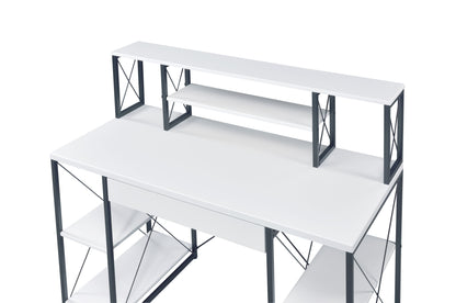The Amiel - All Purpose Writing Desk is a modern white desk with a black metal frame, featuring multiple shelves, including a raised monitor shelf and side storage shelves, all set against a white background.