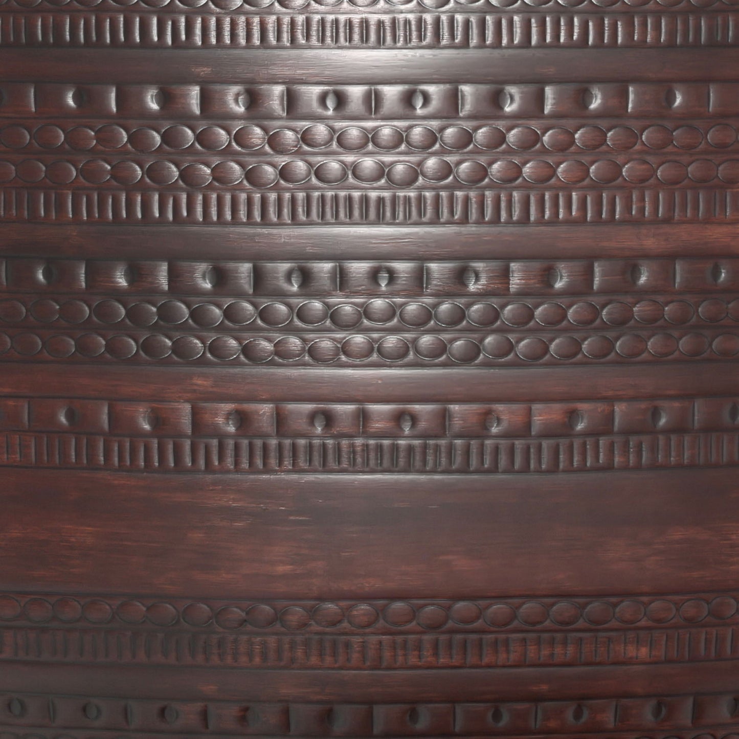 Close-up of the Johnsen Handcrafted Metal Coffee Table shows decorative horizontal bands with carved geometric patterns—circles, dots, and vertical lines—creating a textured and ornate look on its dark surface.