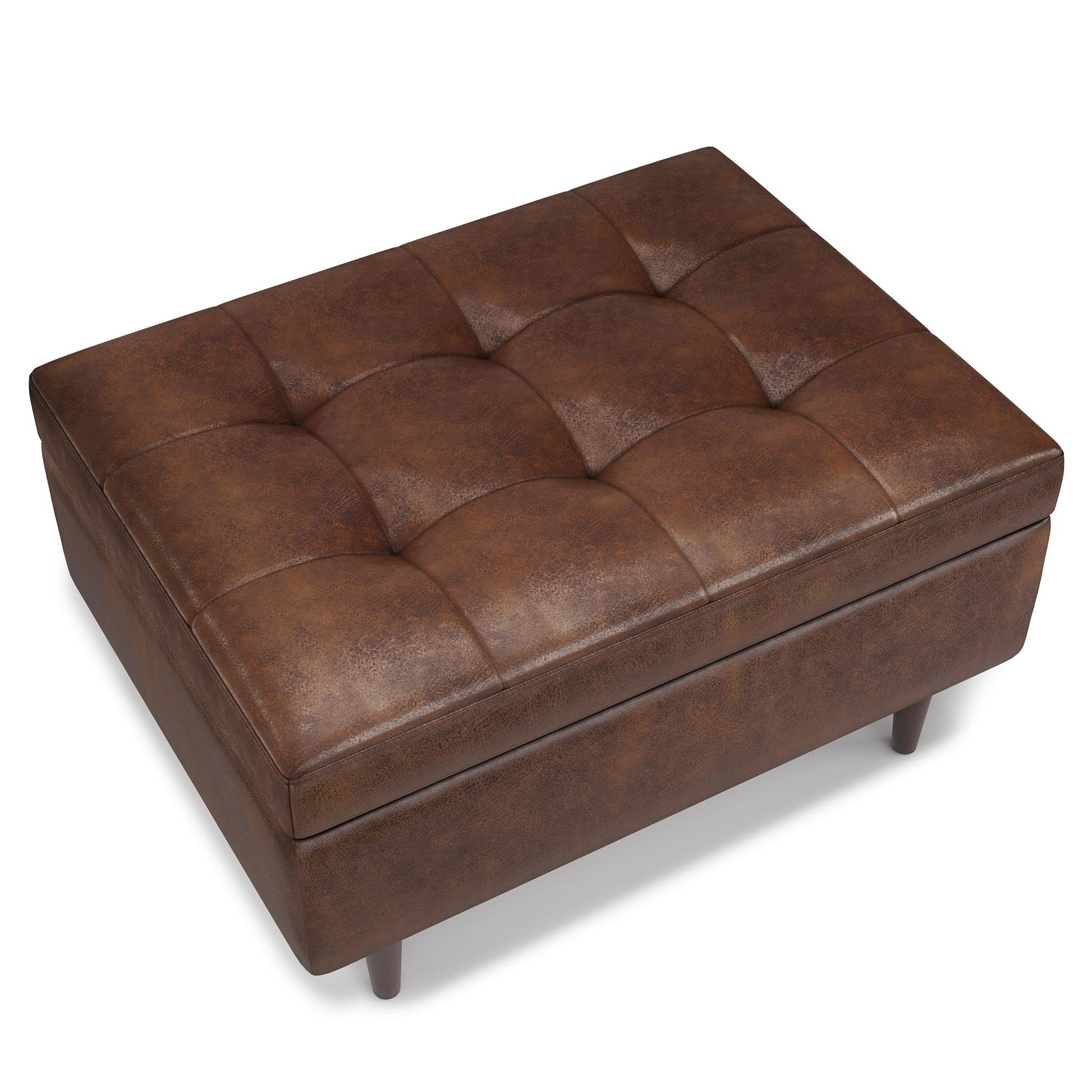 The Shay Large Square Coffee Table Storage Ottoman features a brown, tufted leather top and short, round wooden legs in a mid-century style, shown from an angled top view.