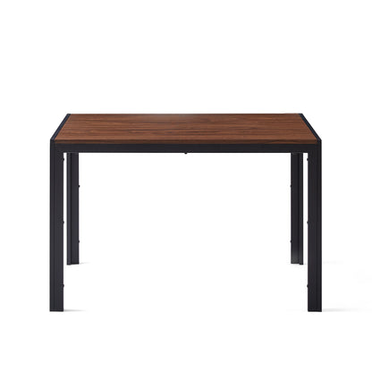 A Creative Design Veneered MDF Wood Structure Rectangular Walnut Dining Table with a walnut top and black metal legs, shown from the front against a white background.