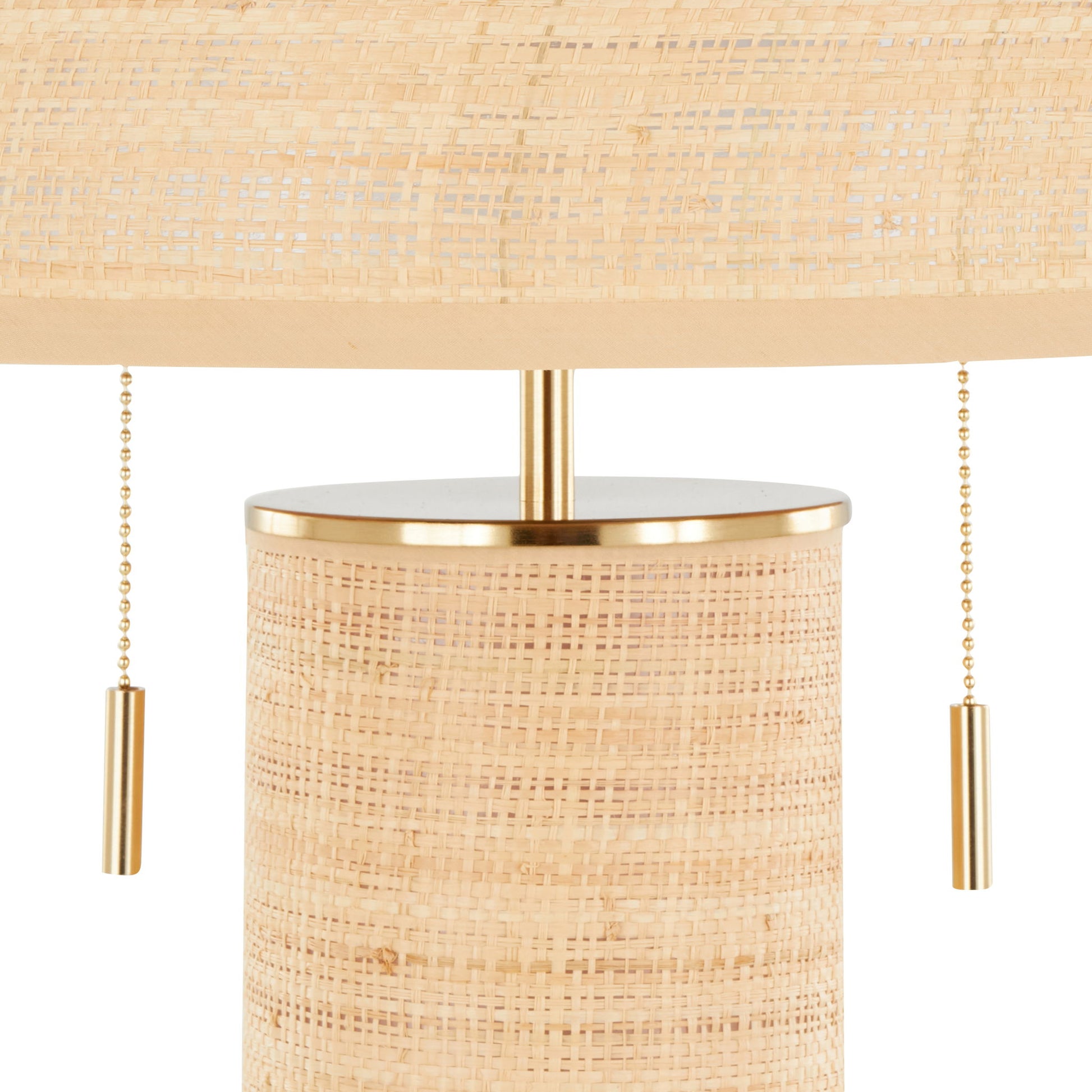 Close-up of the Cylinder - Rattan Contemporary Rattan Table Lamp, featuring a woven rattan cylindrical base and shade, gold-colored metal cap, and two gold pull chains.