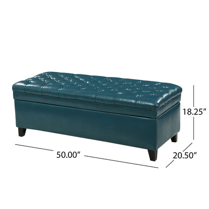 The Juliana Storage Ottoman features a teal tufted leather design with sturdy birch legs. Dimensions: 50" W x 20.5" D x 18.25" H.