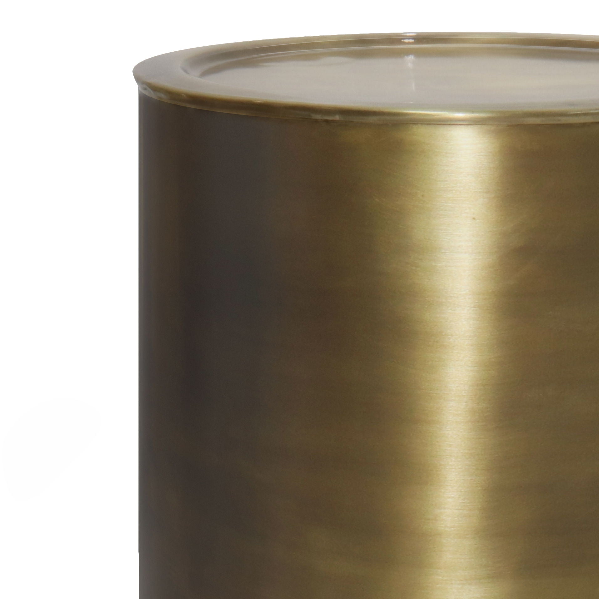 A close-up of the Corbin - Handcrafted Metal Side Table, showcasing its smooth, shiny brass finish on the upper portion and rim against a white background.
