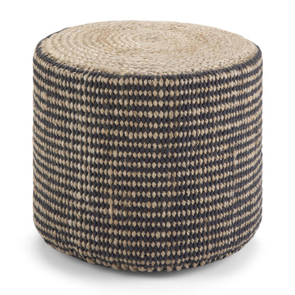 The Larissa Handcrafted Round Braided Pouf features a woven texture, black and natural tan checkerboard sides, and a spiral pattern on top.