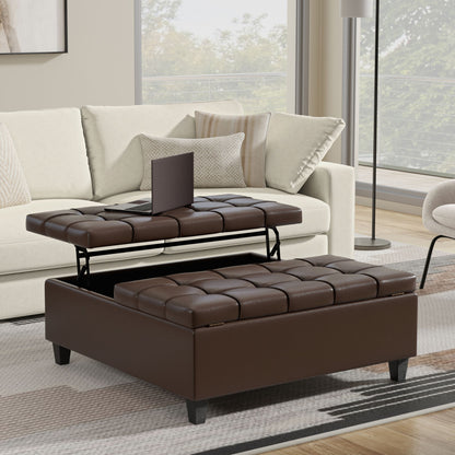 A modern living room showcases a beige sofa and the Harrison - Upholstered Coffee Table Storage Ottoman with a lift-top tray for hidden storage, complemented by large windows and neutral decor.
