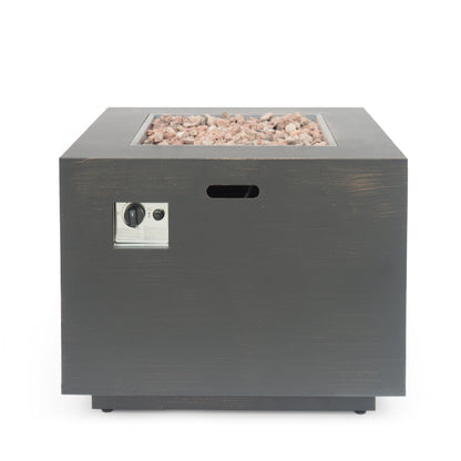 The Outdoor Patio Gas Burning Fire Pit Table 50,000 Btu is a square, dark gray outdoor fire pit with a front control panel and decorative stones on top, shown against a plain white background.