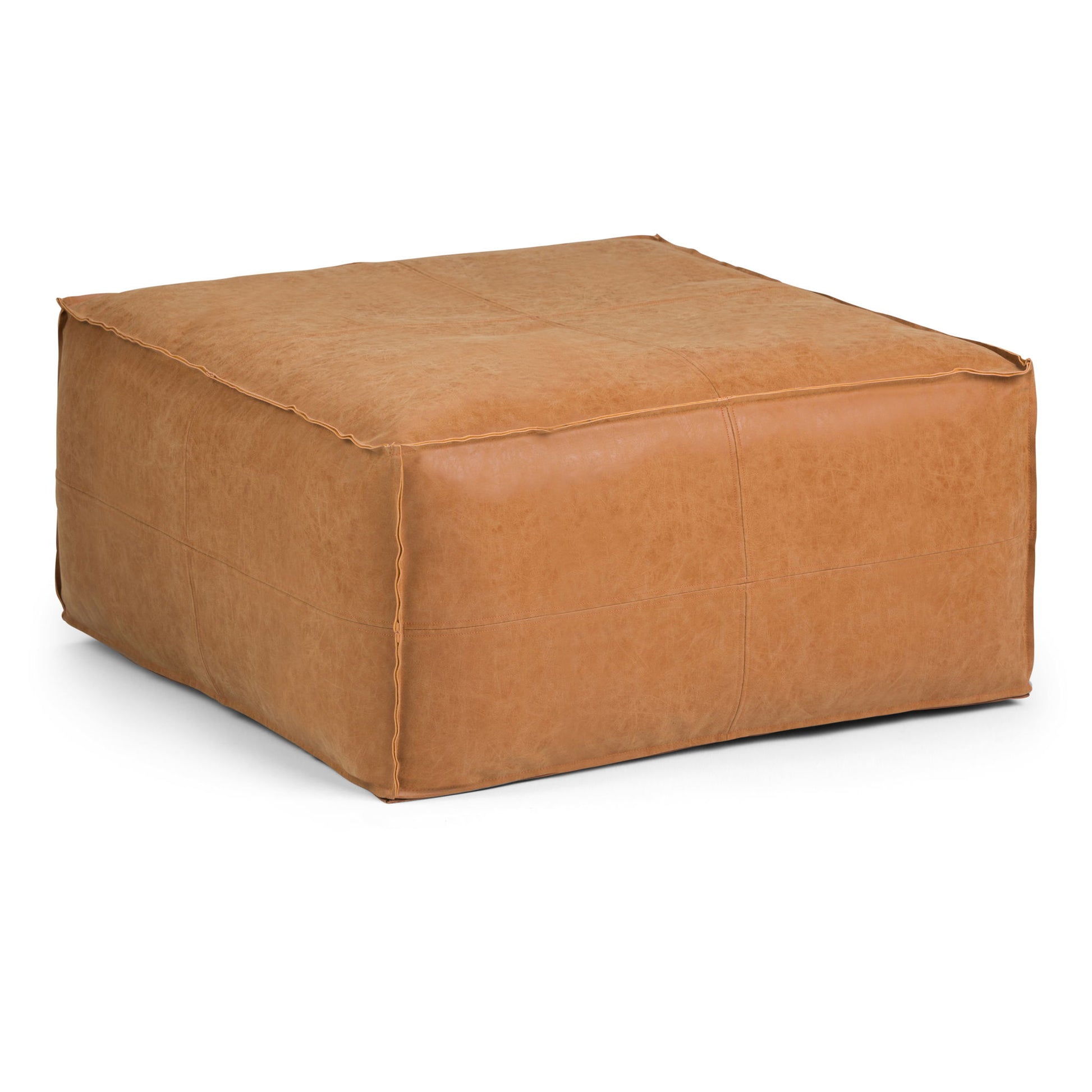 The Brody Large Square Coffee Table Pouf, featuring tan leather and visible edge stitching, is displayed on a white background.
