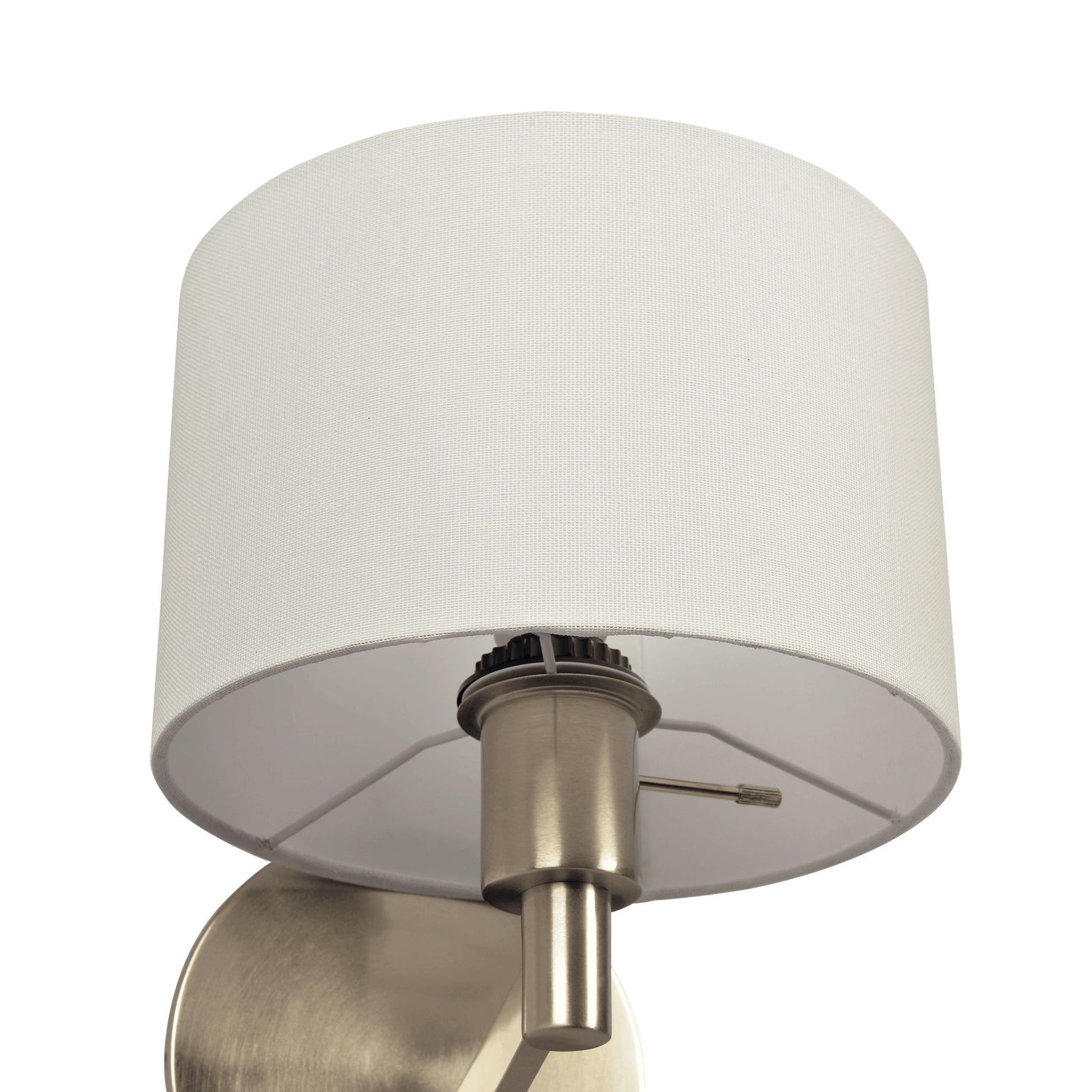 A close-up of the Nebula Base Wall Lamp, featuring a brushed nickel base, rotary switch, and a cylindrical white fabric shade.