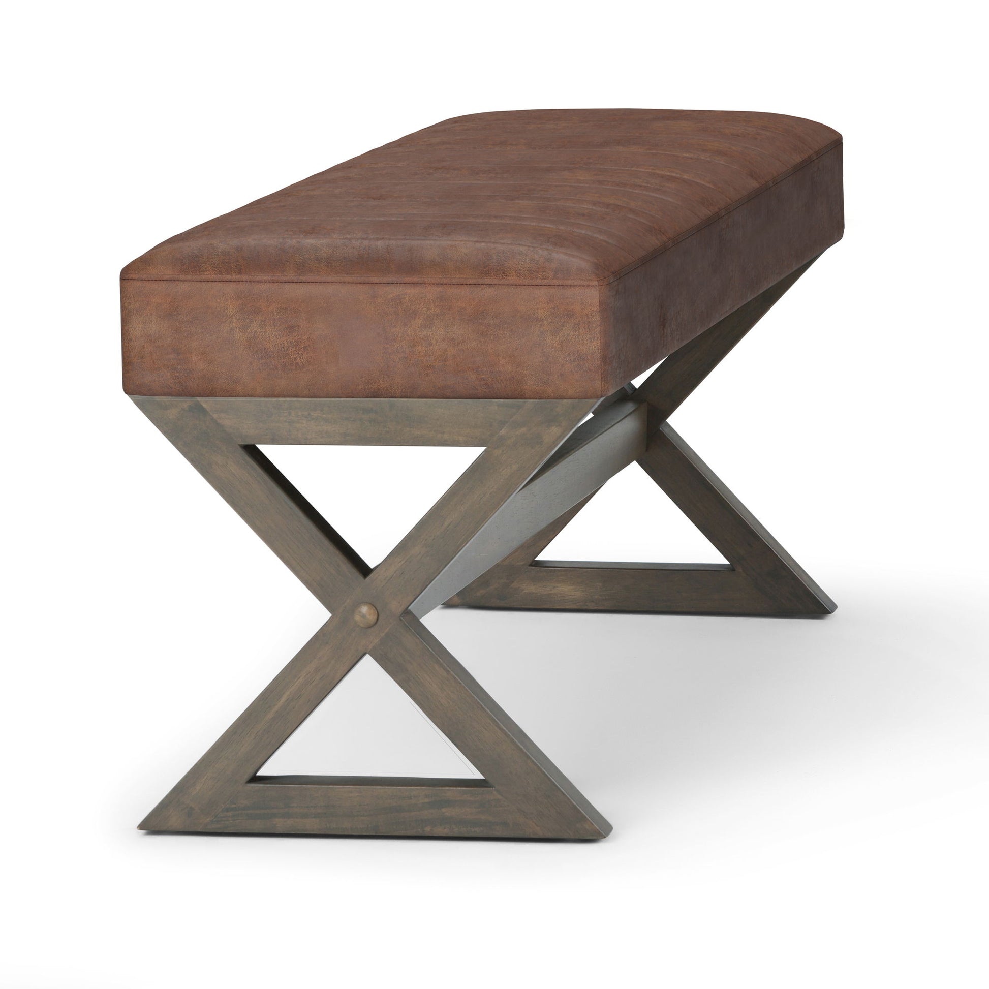 The Salinger - Large Upholstered Ottoman Bench features a brown cushioned seat and a distinctive gray wooden X-shaped base, displayed against a white background.