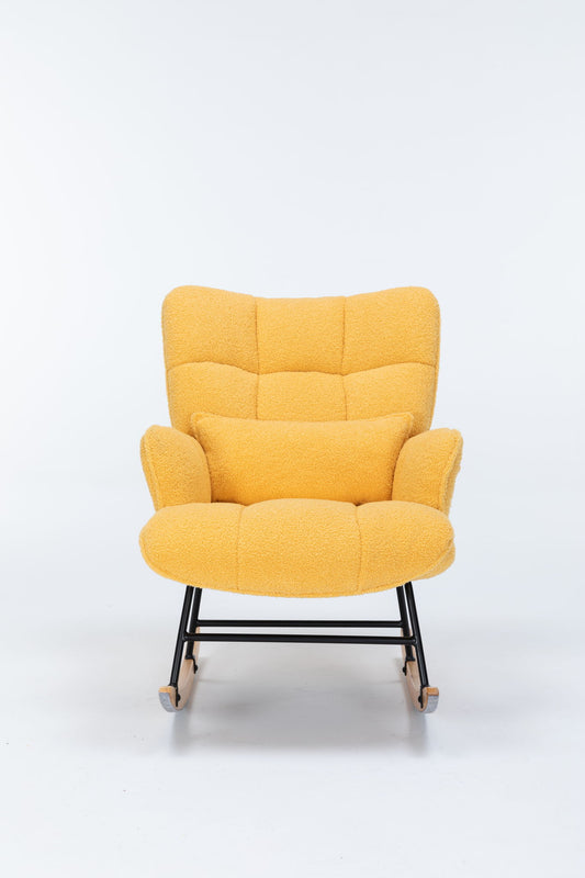 The Rocking Chair Nursery is a yellow teddy upholstered glider rocker with a high backrest and matching pillow, featuring a black metal frame and wooden rocker legs, perfect for living rooms or nurseries.