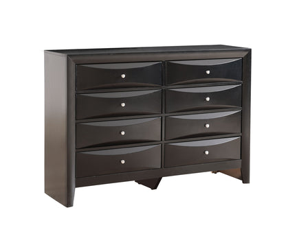 The Marilla - Dresser is a black wooden piece with eight drawers in two columns of four, each finished with a small round silver knob, shown against a white background.