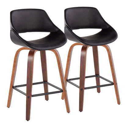The Fabrico set includes two mid-century modern counter stools with black curved seats, low backrests, walnut-finished wooden legs, and black metal footrests.