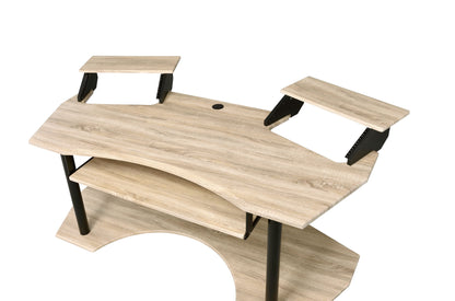 The Eleazar Music Recording Studio Desk features a light wood finish, black metal legs, two raised side platforms, and a lower shelf under the main surface, all set against a white background.