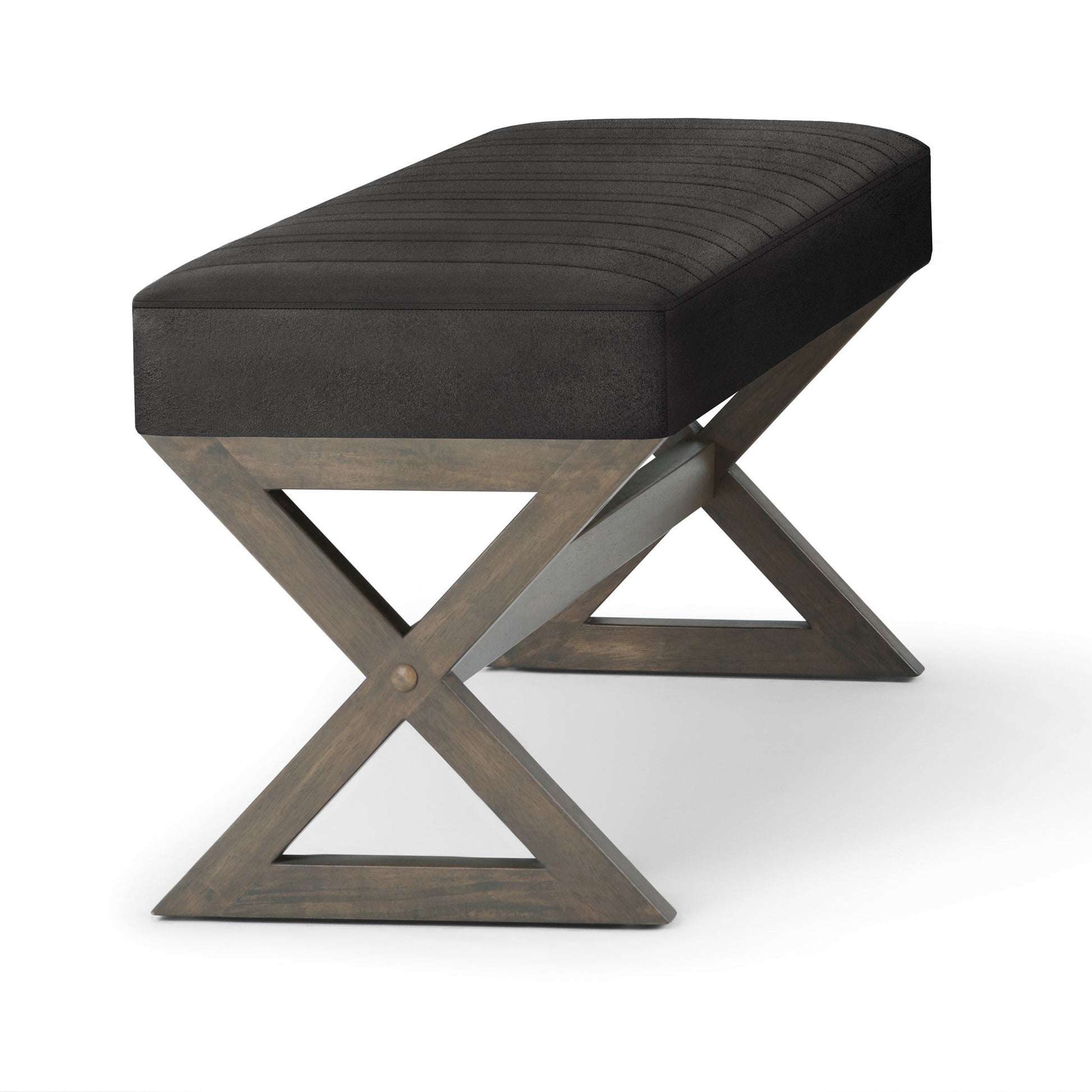 The Salinger - Large Upholstered Ottoman Bench features a black cushioned seat and crossed wooden legs in a natural finish, shown against a white background.