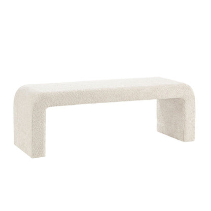 The Modern Contemporary Waterfall Bench - Cream features soft, textured cream upholstery, a minimalist rectangular design with rounded edges, and a seamless look without visible legs or backrest.