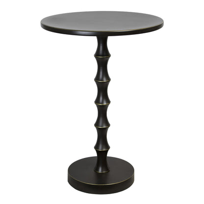 The Bora - Contemporary Table is a small, round black side table featuring a smooth top and a sculpted pedestal base inspired by bamboo segments, resting on a flat circular bottom.