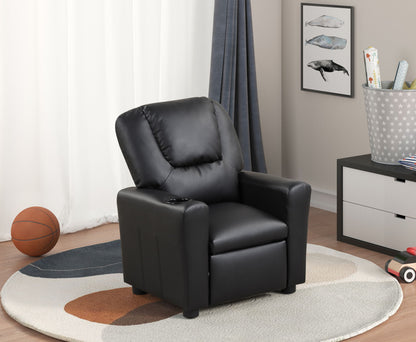 The Marisa - PU Leather Kids Recliner Chair With Cupholder sits on a round patterned rug in a cozy room with toys, a basketball, dresser, whale art, and a window dressed in blue curtains and white drapes.