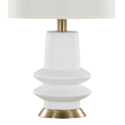 The Lloyd - Contemporary Table Lamp (Set of 2) features a textured white base with geometric ridges, a gold-colored circular bottom, and a white lampshade for a modern look.