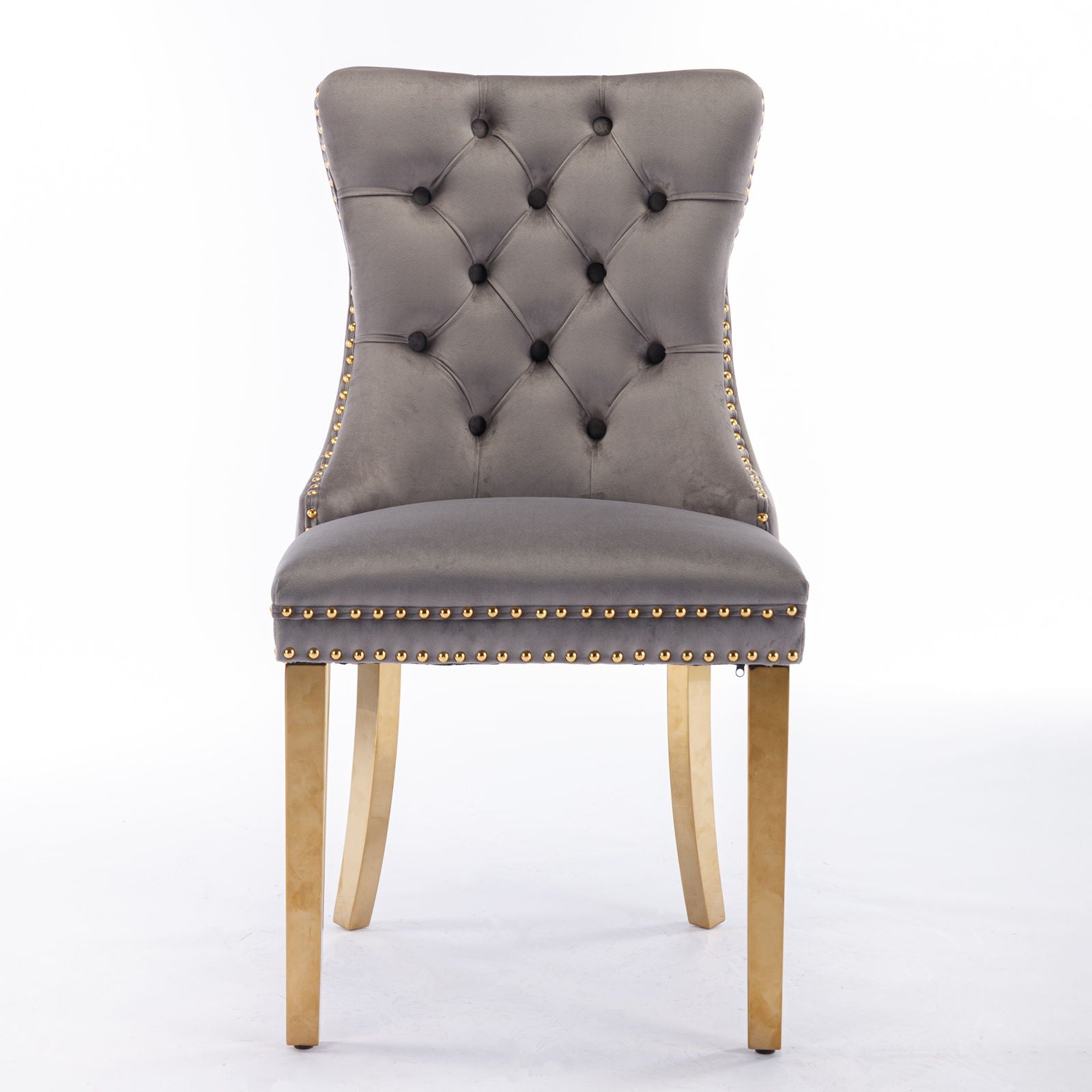 The Nikki set includes two modern, high-end tufted velvet dining chairs with nailhead trim and golden stainless steel-plated legs, shown against a plain white background.