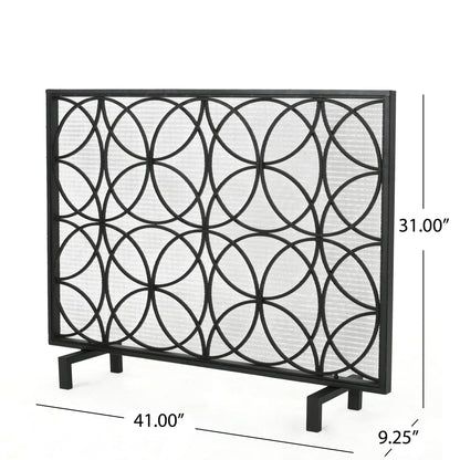 The Thayer Single Panel Iron Fireplace Screen features a geometric overlapping circle pattern, mesh backing, sturdy legs, and a rectangular shape. It measures 31"H x 41"W x 9.25"D.
