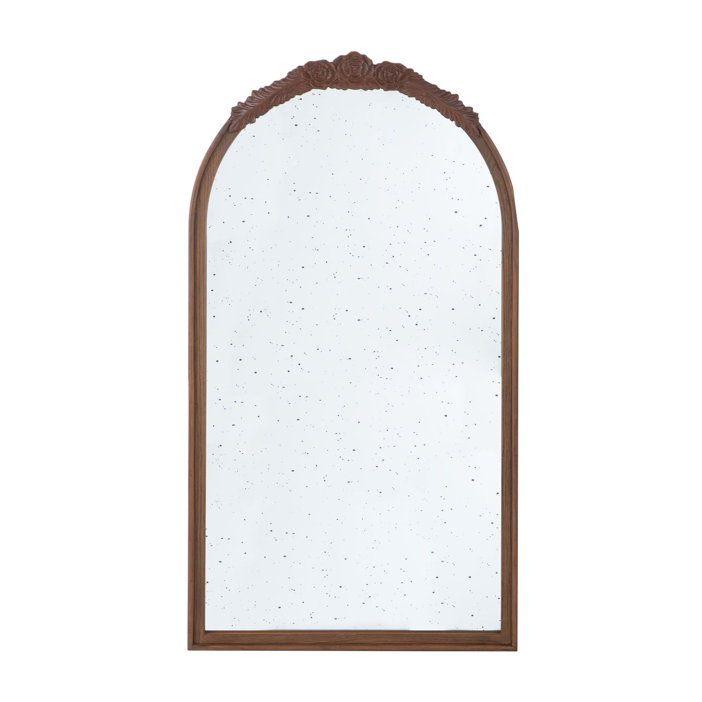 The Hand Carved Rose Antique Mirror features a tall wooden arch frame with ornate floral carving and a slightly speckled antiqued glass, perfect for living room wall decor.