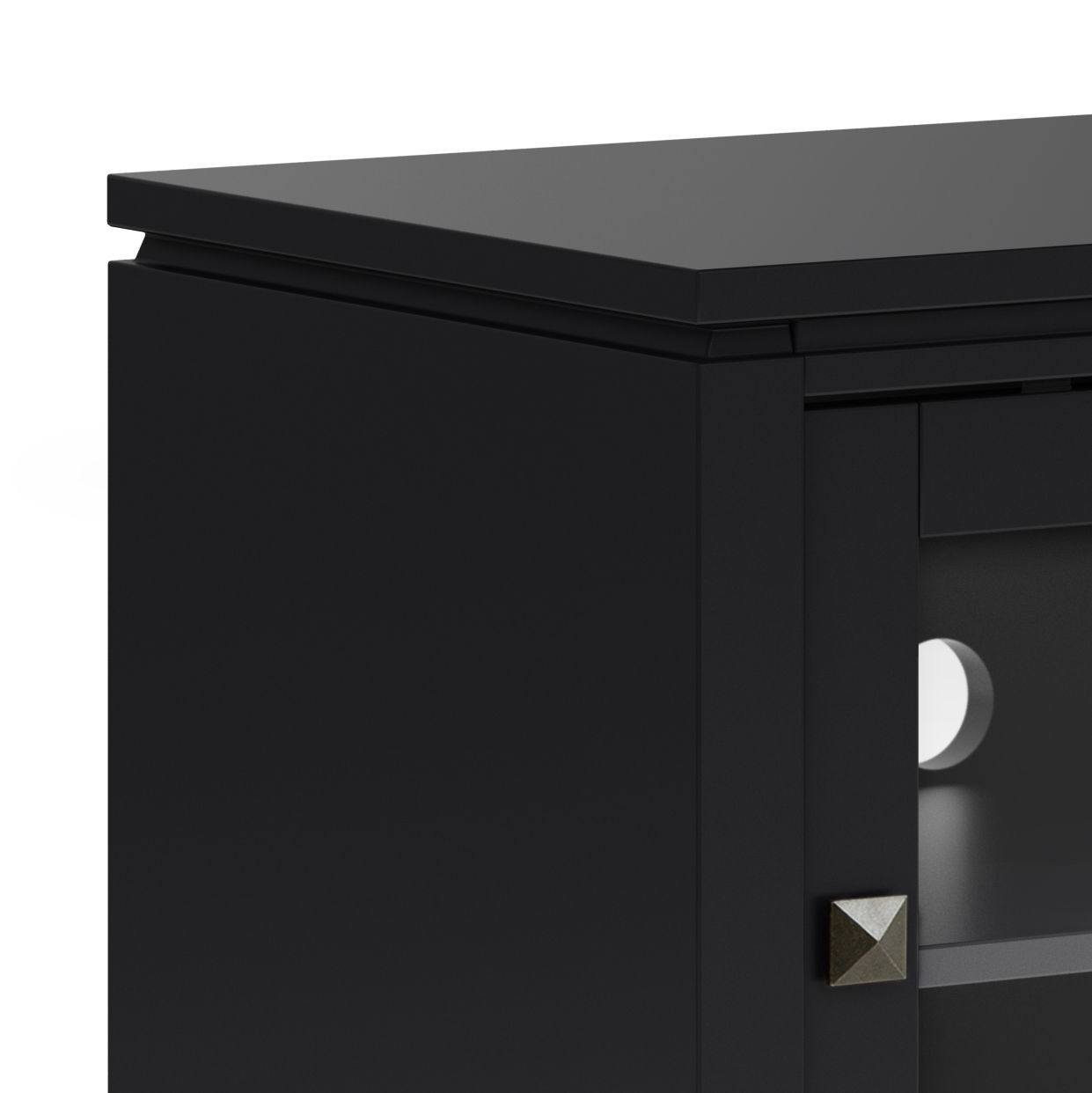 Close-up of the corner of the Cosmopolitan - Handcrafted TV Media Stand, featuring a black finish, flat top, decorative metal knob, and a round cable management hole inside.