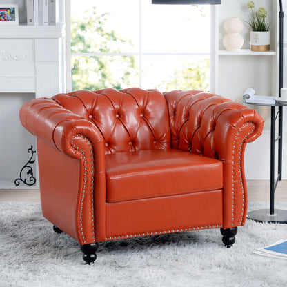 A 1 Seater Sofa For Living Room with red tufted leather, rolled arms, and nailhead trim sits on a light gray shag rug in a bright modern space with large windows and decorative shelves.