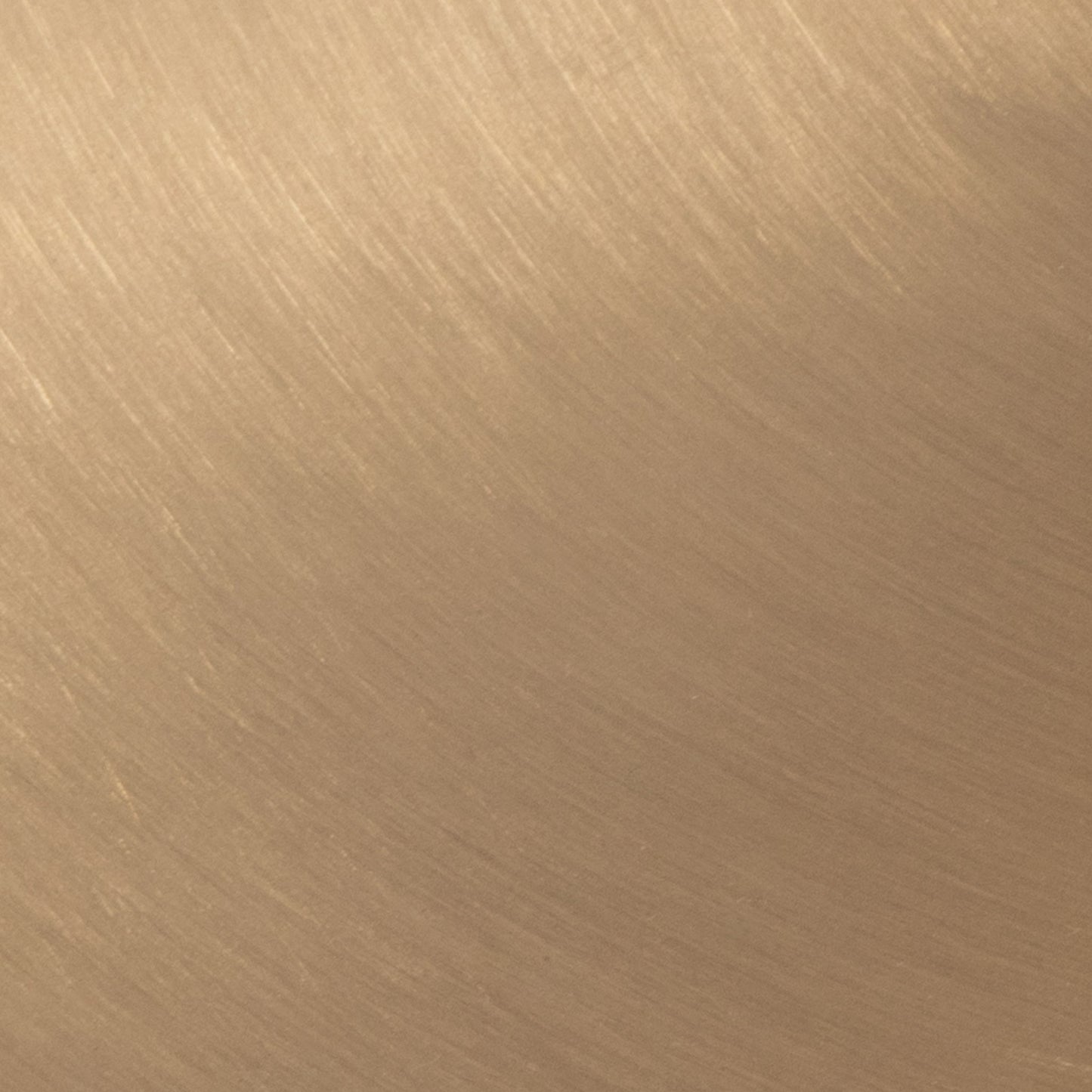 Close-up of Bora - Contemporary Table's smooth, brushed metal surface in a warm golden-brown tone. Fine linear textures add an elegant pattern and modern appeal.