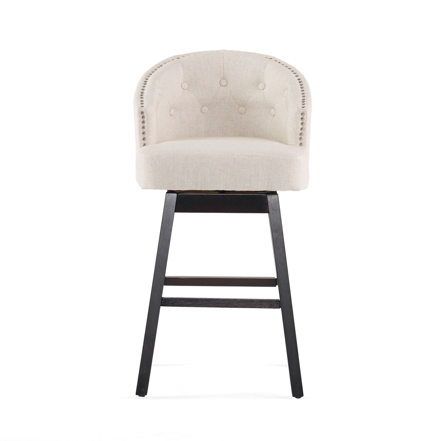 The Mellifluous 360 Degree Swivel Bar Stool, set of 2, features a beige upholstered seat, rounded tufted backrest, striking silver nailhead trim, and black wooden legs—perfectly stylish against a white background.