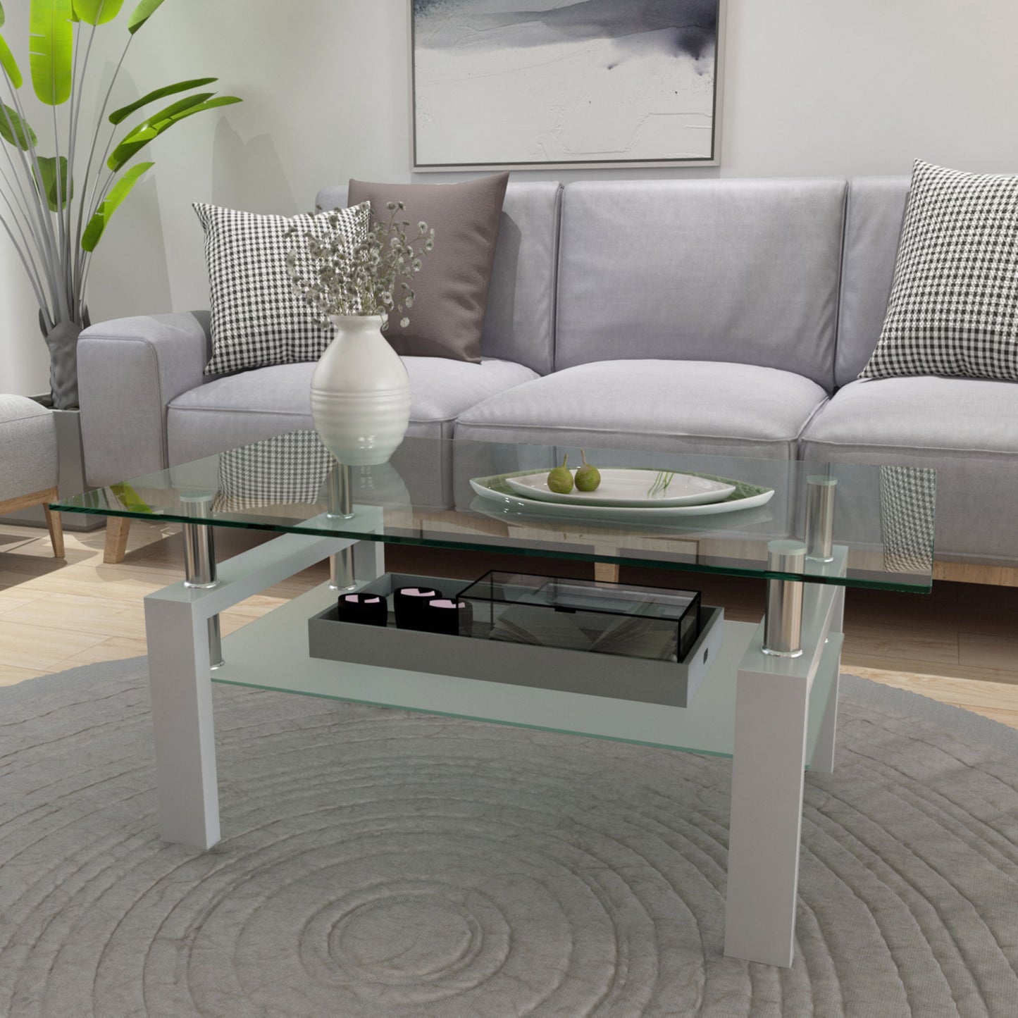 A modern living room with a Rectangle Coffee Table, Modern Side Center Tables For Furniture, holding a white vase with flowers and a decorative plate, placed before a light gray sofa with plaid pillows on a round patterned gray rug.
