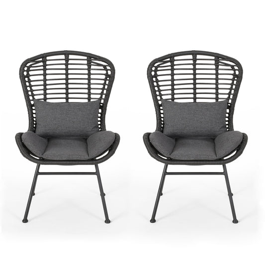 The Calypso Outdoor Chairs feature black rattan-style design, high backs, iron frames, and water-resistant dark gray seat and lumbar cushions; shown side by side on a white background.