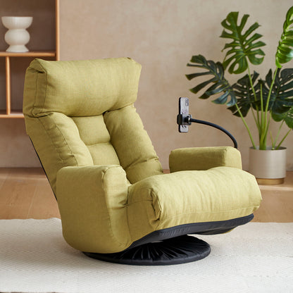 An Adjustable Swivel Lounge Chair with a 360° rotating seat and headrest support in green sits on a white rug in a modern room, next to a potted monstera plant and wooden shelving. It features a built-in phone holder for added convenience.