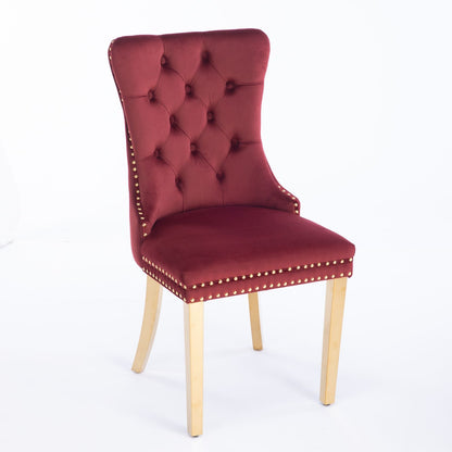 The Nikki set features two modern velvet upholstered dining chairs with tufted backs, nailhead trim, and golden stainless steel-plated legs, combining high-end contemporary style and solid wood construction.