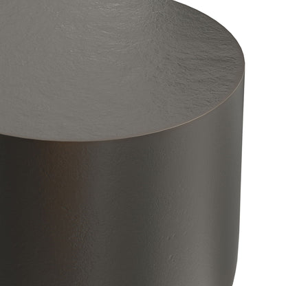 Close-up of the Anthony - Cast Aluminum Side Table in Bronze, showcasing its smooth, rounded top and side edges with a subtle matte texture on a dark gray metallic surface. The background is white.