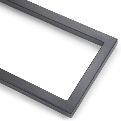 A close-up of the Skyler - C Side Handcrafted Table’s rectangular, dark gray frame against a white background, highlighting the corner and sides.