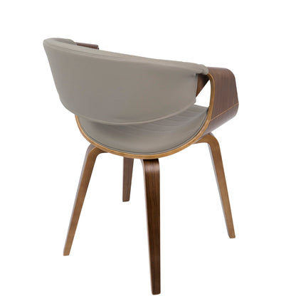 The Symphony - Mid Century Modern Dining Chair features a curved wooden frame, angled legs, and a light gray cushioned backrest and seat. It is displayed from a rear side angle against a white background.